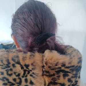 Women's hooded vest in faux leopard